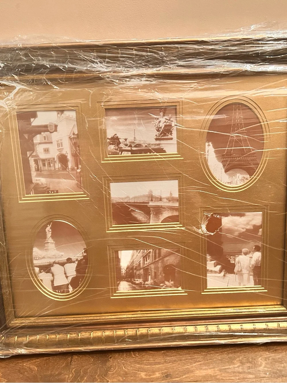 Vintage Bombay Company 7-opening collage picture frame, still in its original.